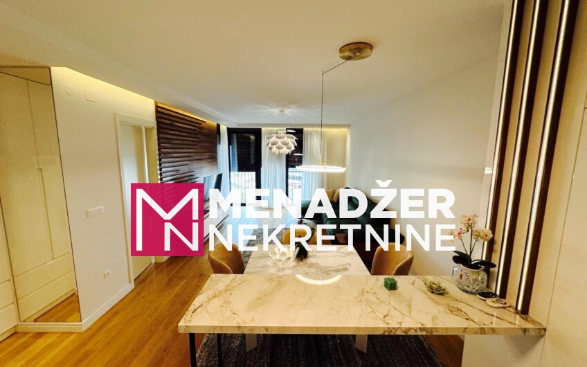 JEDNOSOBAN LUX NAMJEŠTEN STAN 57 m2 SA GARAŽOM-PREKO MORAČE-LINEA